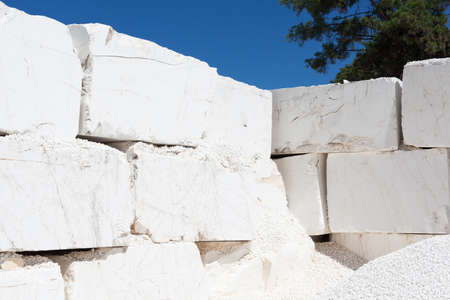 Stack of huge raw marble blocks from a quarryの写真素材