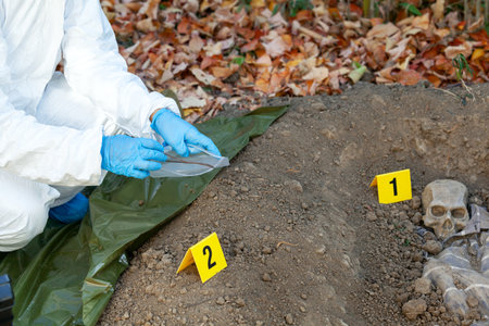 War crime investigation. Forensic science specialist at work.の写真素材