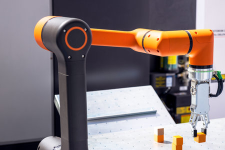 Industrial pick and place and insertion, quality testing or machine tending robot armの写真素材