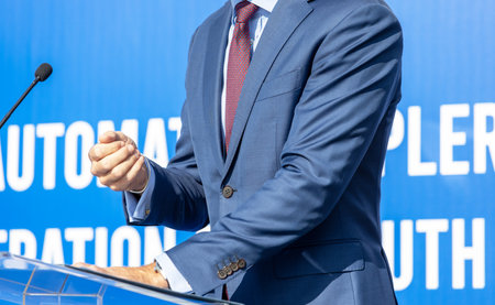 Speaker at press conference, corporate presentation, company meeting, public or political event....