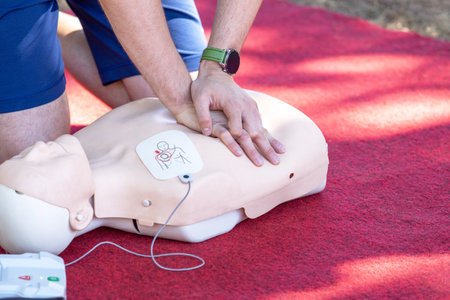 First aid and CPR training using automated external defibrillator device - AEDの写真素材