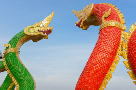 Thai dragon or king of serpent statue in thai templeの写真素材