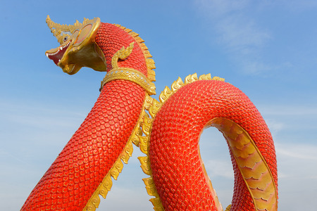 Thai dragon or king of serpent statue in thai templeの写真素材