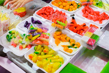 small imitated fruits as a Thai sweet snack called Look chub LOOK CHUB --Traditional Thai Snack Made of Green Bean.の写真素材