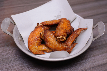 grilled chicken wings on stainless dish.の写真素材