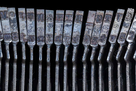 Antique Typewriter letters closeup photo - Vintage old Typewriter Machine detail