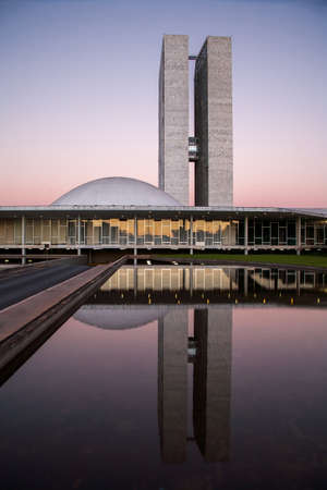 BRASILIA, BRAZIL - MAY 26, 2006 - Brazilian national congress at nightfall with reflections on lake