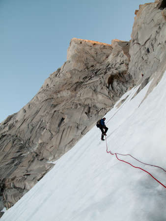 Abseling on ice mountain