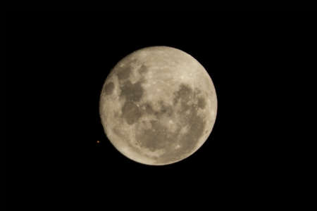 Moon and Mars conjunction almost occultationの写真素材