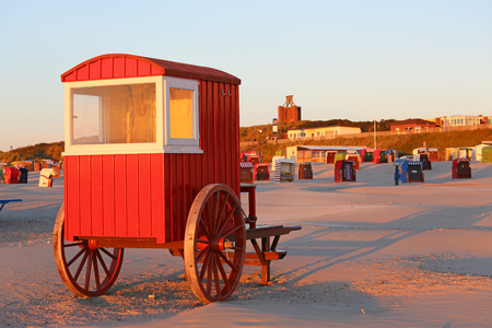 red wagon on the beachの写真素材