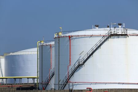 White oil tanks in the port of Hamburgの写真素材