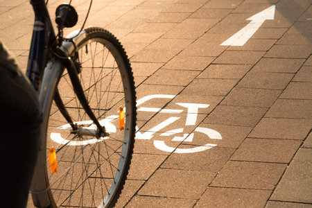 front wheel of a bicycle on bike lane
