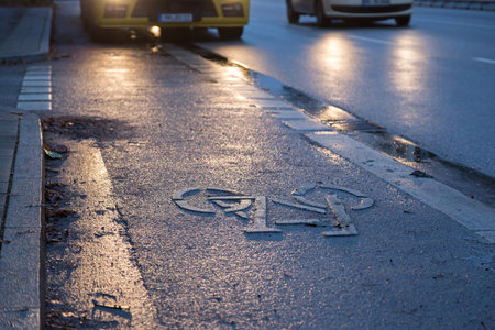 Truck stands on a bike path in the semi-darknessの写真素材