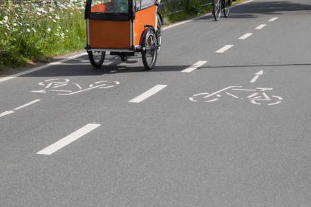 cargo bike on a cycle highwayの写真素材