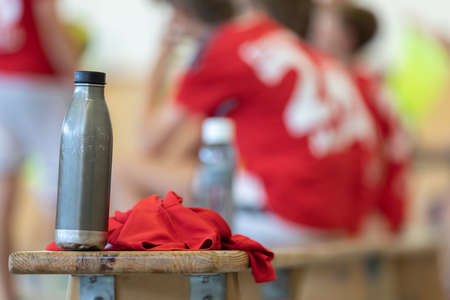 water bottle on wooden benchの写真素材