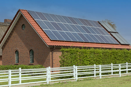 solar panels on the roof of a renovated barnのeditorial素材