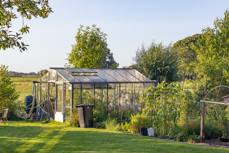 glass house in a rural gardenの写真素材