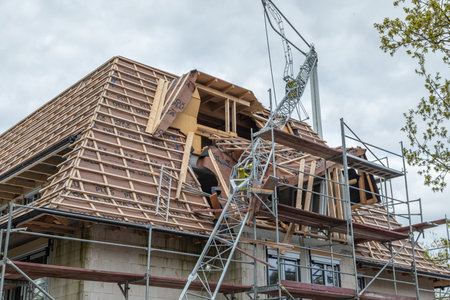 Construction crane fell onto the new roof structureのeditorial素材