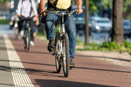 man with rusty bicycle on the bike path