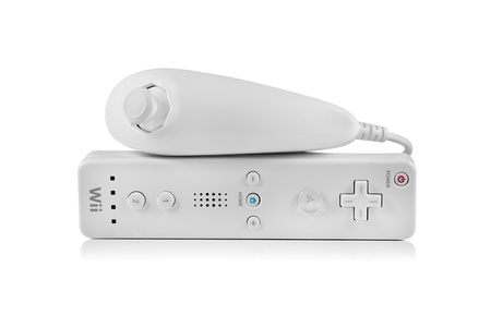 Springfield, Missouri - January 9, 2011: A studio shot of a Nintendo Wii nunchuk and controller set...
