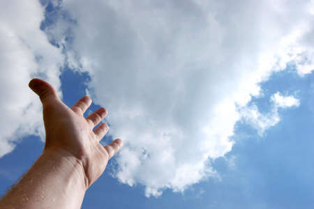 Hand up to the skyの写真素材