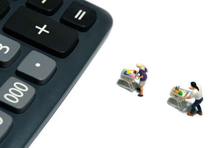 people with cart lining up to calculator, calculate total purchase for groceries. Miniature people...