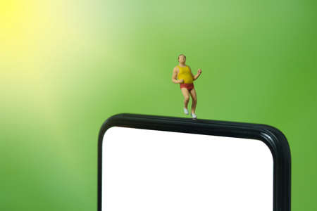 Running and jogging tracking app concept. A fat men running above smartphone. Miniature people...