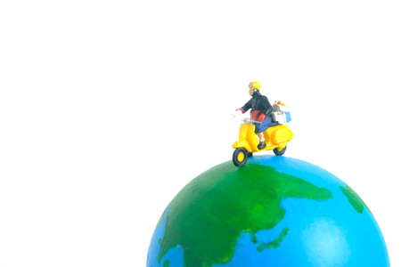 Miniature people toys conceptual photography. Global, international delivery service. Postman,...