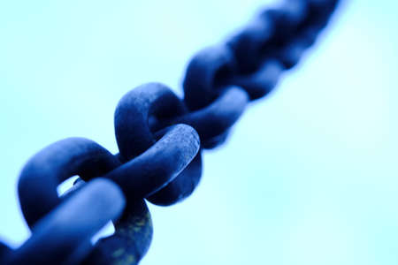 Detail macro photography. Close up of rustic chain. cold tone