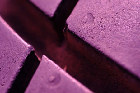 Abstract macro photography. close up tire texture pattern with violet lightの写真素材
