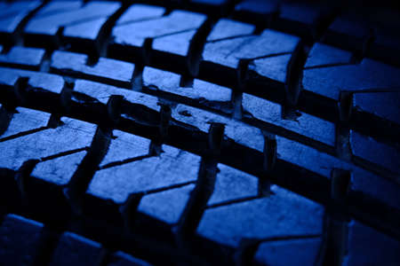 Abstract macro photography. close up scratch and hole tire texture pattern with blue light tone...