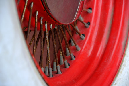 Detail macro automotive photography. Close up old rustic wheel bars. image photoの写真素材