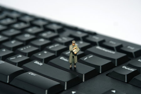 Miniature people toy figure photography. A military mail officer holding news pack envelope standing...