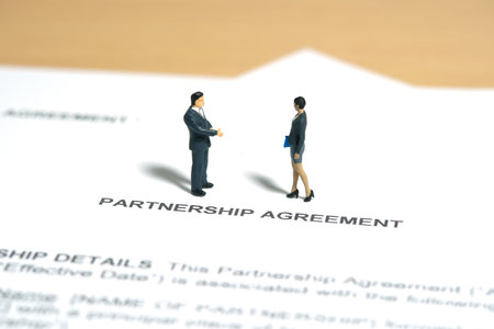Miniature people toy figure photography. Business partner contract signing concept. A businesswoman walking above partnership agreement file document. Image photoの写真素材