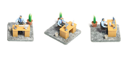 Miniature tiny people toy figure photography. Workspace station layout design concept. A businessmen...