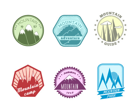 A set of high quality polyangular and round snowy mountains peaks travel guide labels iconsのイラスト素材