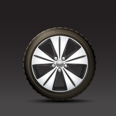 Realistic rubber and metal car wheel on black background vector illustrationのイラスト素材