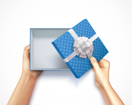 Human hands holding gift box top view realistic 3D square carton with blue polka dot pattern vector illustrationのイラスト素材