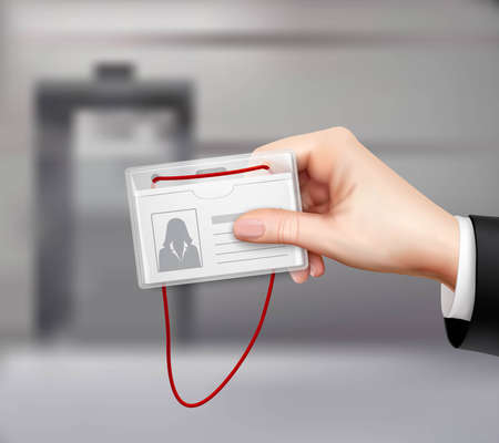Business id card with red cord displayed in businessman hand closeup realistic image blurred...
