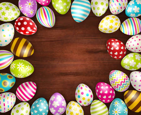 Realistic background with beautiful painted easter eggs on wooden surface vector illustrationのイラスト素材