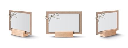 Cardboard empty place cards decorated with rope bow on wooden holder realistic set isolated vector illustrationのイラスト素材