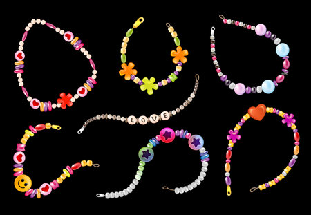Realistic hippie bracelet set with isolated images of string love beads with snaps on black background vector illustrationのイラスト素材