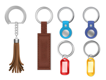 Realistic set of silver metal keyrings with various leather and plastic pendants isolated vector illustrationのイラスト素材