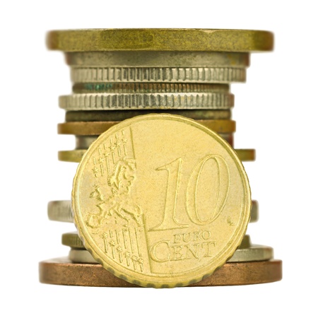 Coin pile with ten cent euro isolated on white backgroundの写真素材