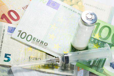 Euro banknotes with medical instrumentsの写真素材