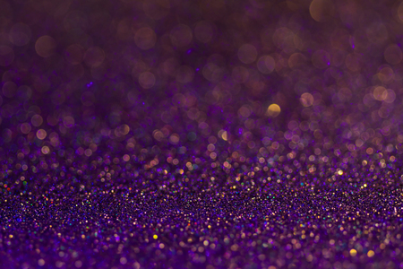 Amazing glitter and glow multi colored bokeh shining. Dark abstract dreamy wunderful sparkle backgroundの写真素材