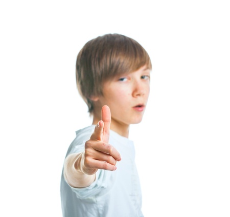 Portrait of young beautiful boy in whiteの写真素材