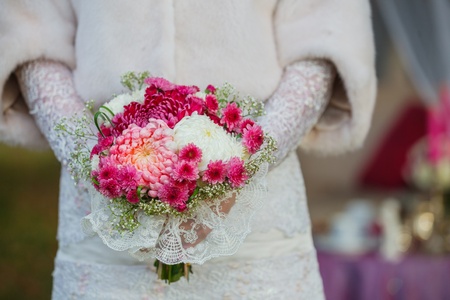 Bride holding wedding bouquetの写真素材