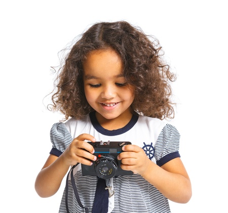 Happy mulatto girl with cameraの写真素材