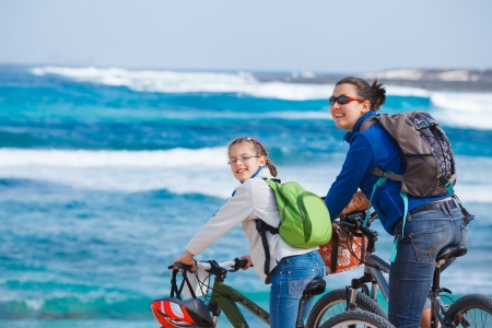 Family having a excursion on their bikesの写真素材